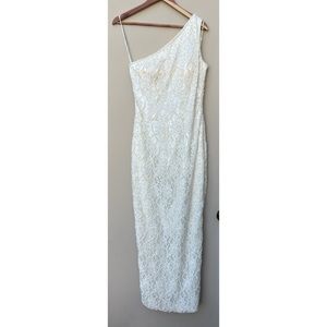 Ivory lace one shoulder beaded gown with slit in back